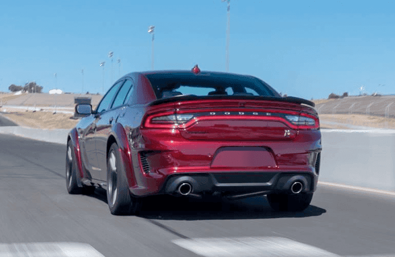 2023 Dodge Charger rear view in red on a track