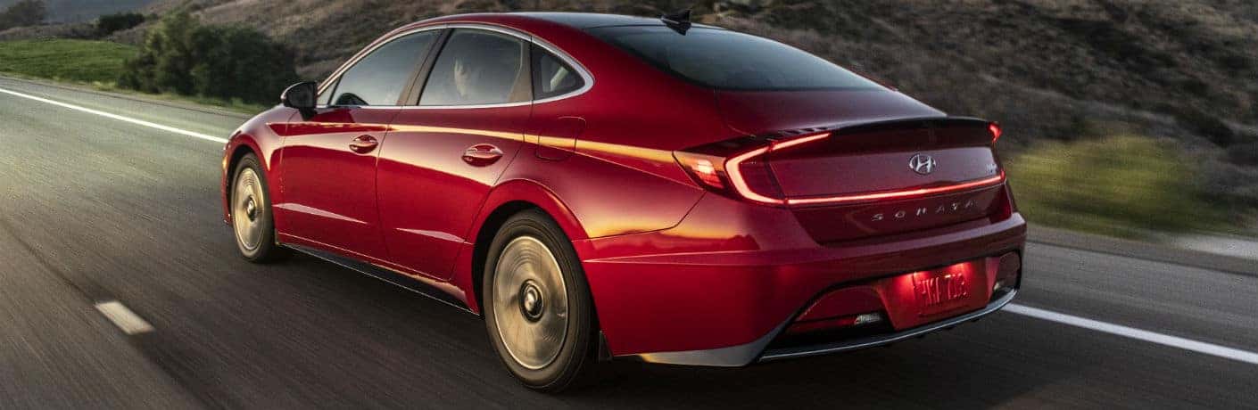 2020 Hyundai Sonata Hybrid side and rear view in red