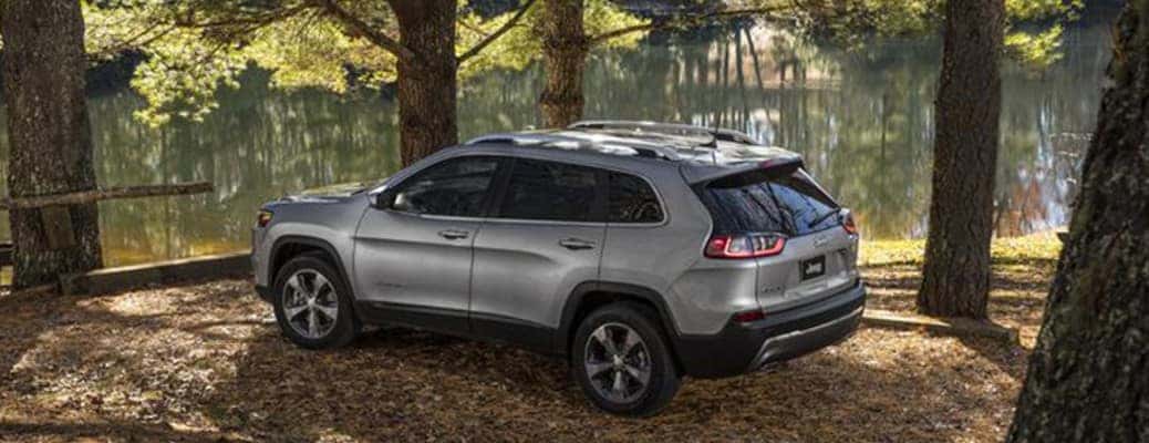 2020 Jeep Cherokee side and rear view in a forest