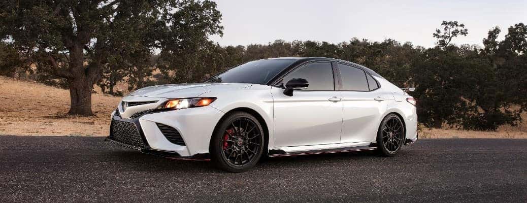 2020 Toyota Camry front and side view with white paint