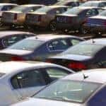 a view of cars parked in a packed parking lot