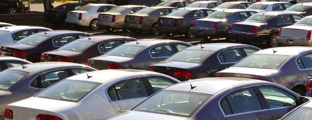 a view of cars parked in a packed parking lot