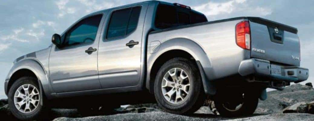 2020 Nissan Frontier side and rear view in silver