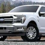 2024 Ford F-150 white truck front and side view
