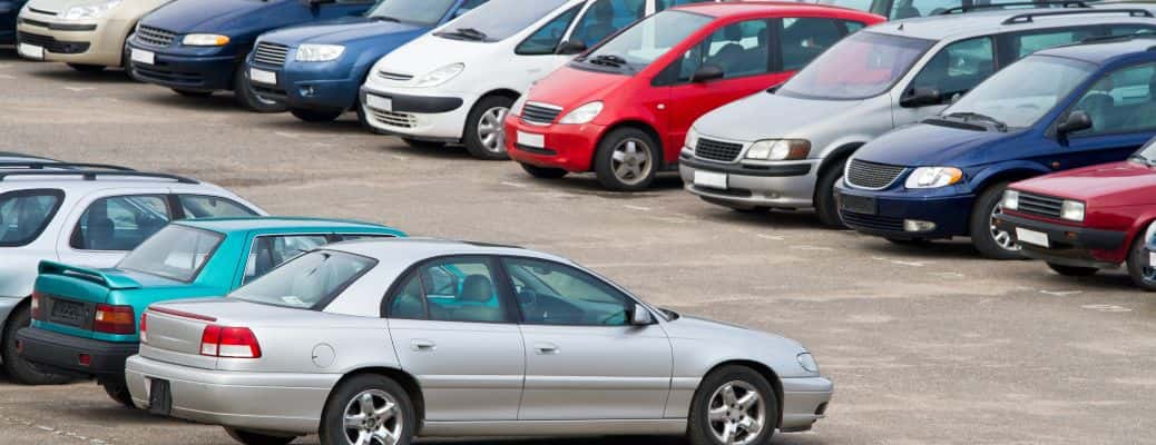 a used car lot with a variety of pre-owned vehicles