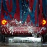 a vehicle passing through an automatic car wash