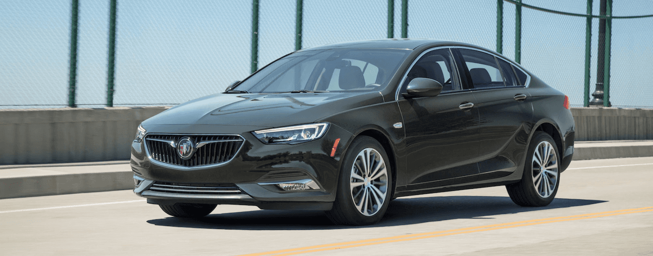 Black 2019 Buick Regal driving on bridge