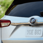 The back of a silver 2019 Buick Envision is shown.