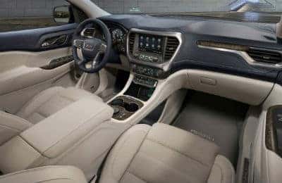 2020 GMC Acadia Denali interior front cabin seats steering wheel and dashboard