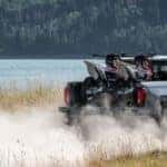 2020-GMC-Sierra-Denali-Carbon-Pro-Exterior-Passenger-Side-Rear-Profile-Blowing-Dust_o
