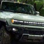 2024 GMC HUMMER EV SUV Exterior Passenger Side Front Angle in Mud