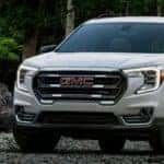 White 2022 GMC Terrain parked on gravel surface