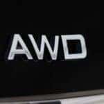 The AWD written behind a car.
