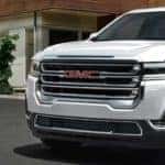 2022 GMC Acadia parked in front of a building
