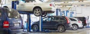a car in the air in a car service center