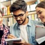 three young people with books