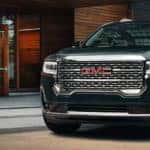 2023 GMC Acadia Denali parked in a city