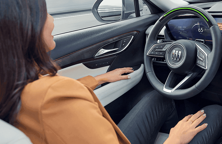 2024 Buick Envision interior with a driver
