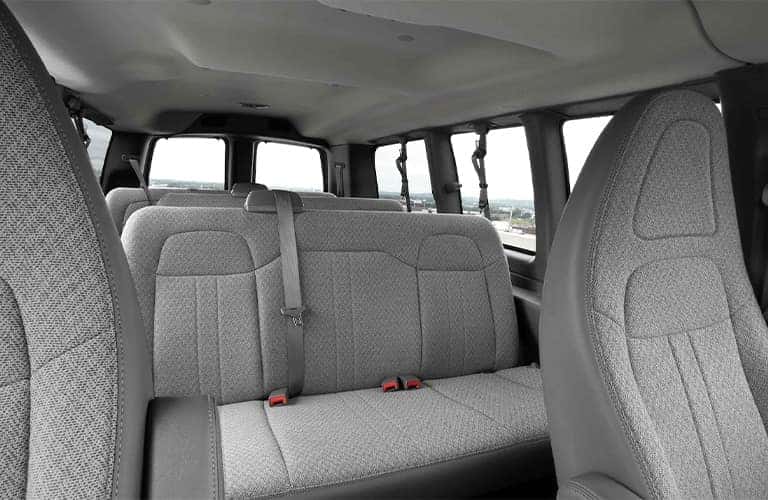 What are the interior dimensions and cargo space of GMC work vans