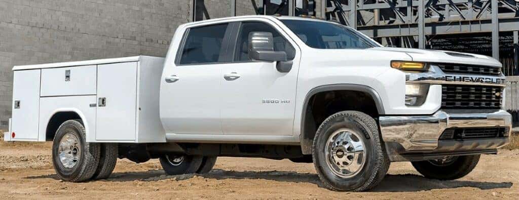 2023 GM work truck side view with white paint