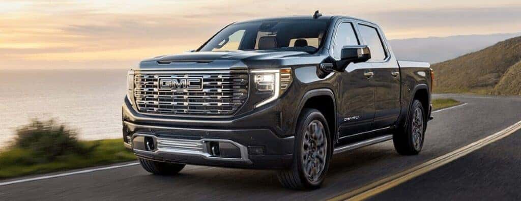 2024 GMC Sierra truck on a coastal road