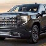 2024 GMC Sierra truck on a coastal road