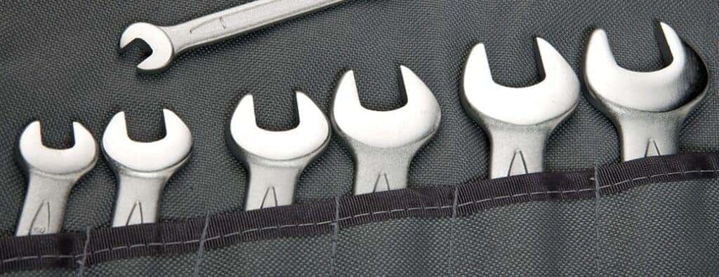 different size wrenches in pockets