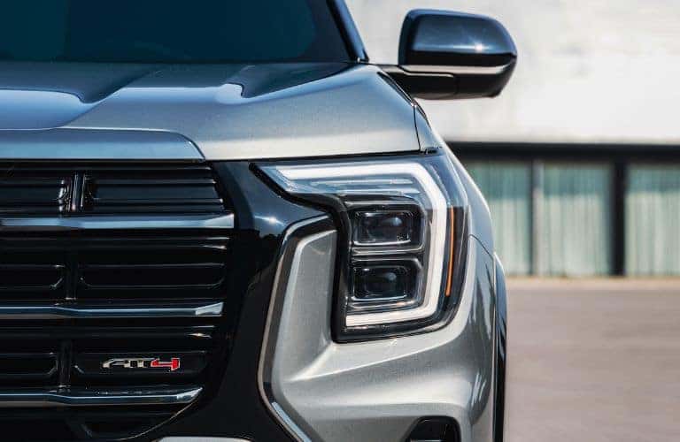 2025 GMC Terrain headlight, side mirror, and grille close up