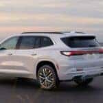 2025 Buick Enclave rear view parked by a beach