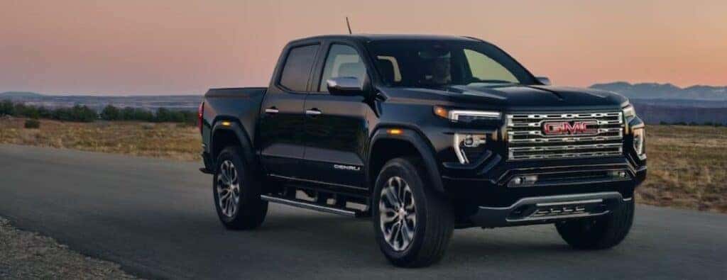 2024 GMC Canyon Denali front view on a road