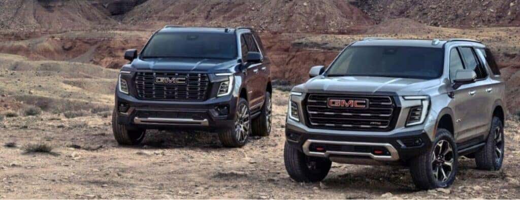 2025 GMC Yukon SUVs side by side