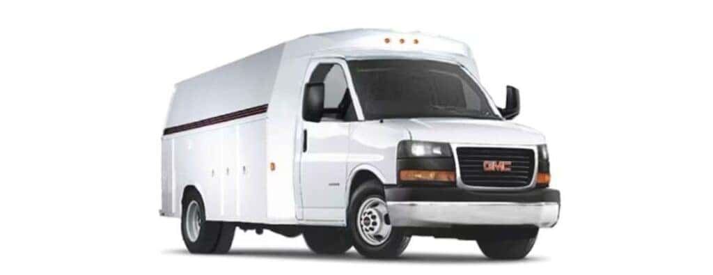 GMC Utility bed truck with a white background