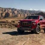2025 GMC Canyon truck red off-road on sand