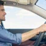 a person driving a Buick vehicle