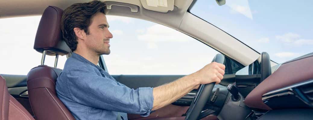 a person driving a Buick vehicle