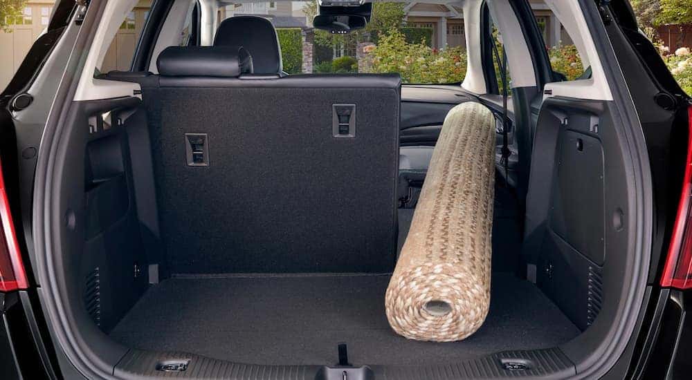 A rug in the back of a 2019 Buick Encore cargo area