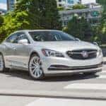A silver 2019 Buick LaCrosse driving leaving a Buick dealership near me