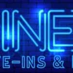 A neon sign with the words diners, drive-ins and dives
