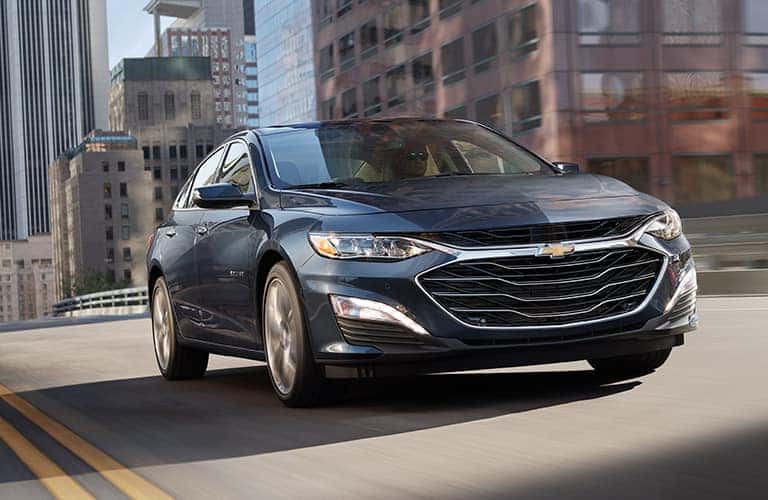 2019 Chevy Malibu driving downtown