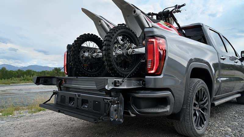 2020 GMC Sierra 1500 Dirtbikes in the truck bed