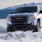 2021 GMC Canyon AT4 driving through snow