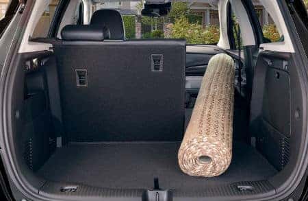 2020 Buick Encore interior rear cabin cargo space right rear passenger seat folded down