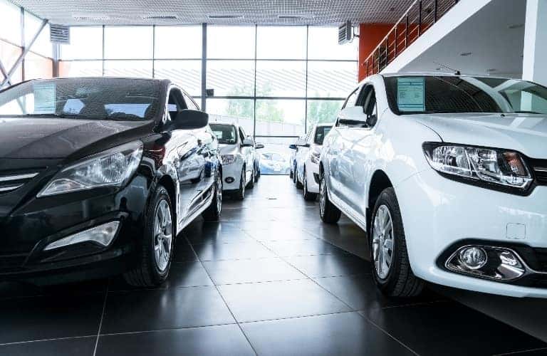Various cars in a showroom