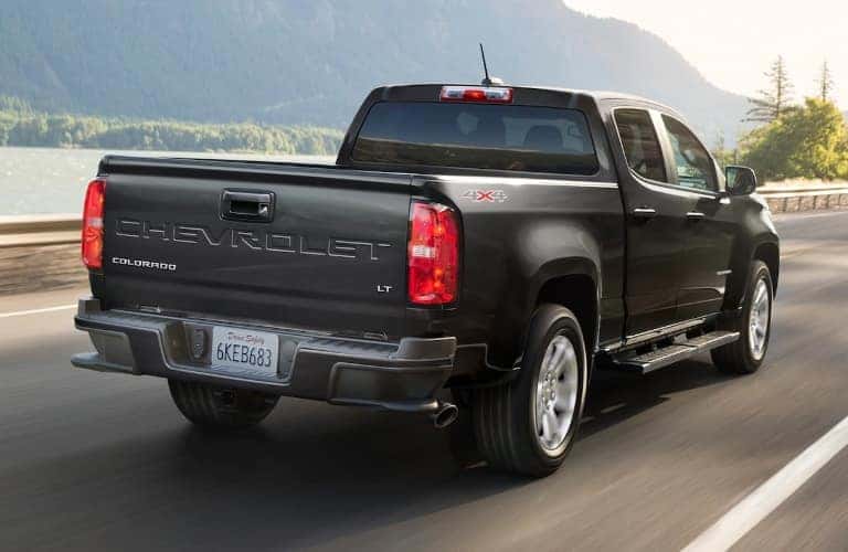 2021 Chevrolet Colorado driving away with hills in the background