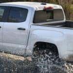2021 GMC Canyon going through a puddle