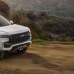 2021 Chevrolet Tahoe going down a dirt road