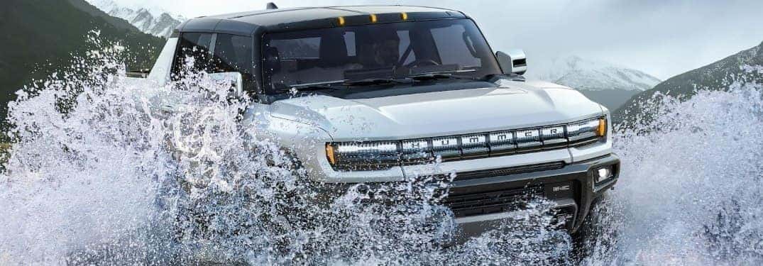 2022 GMC Hummer EV going through a puddle