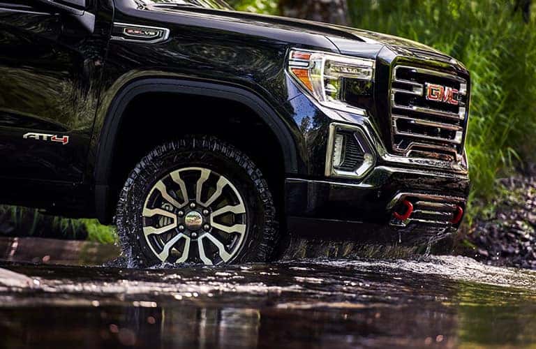 2021 GMC Sierra 1500 going through a puddle
