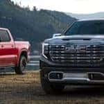 Two 2022 GMC Sierra 1500 trucks next to each other