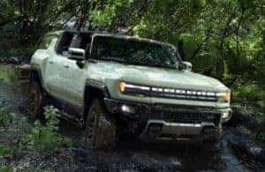 GMC Hummer EV SUV driving off road
